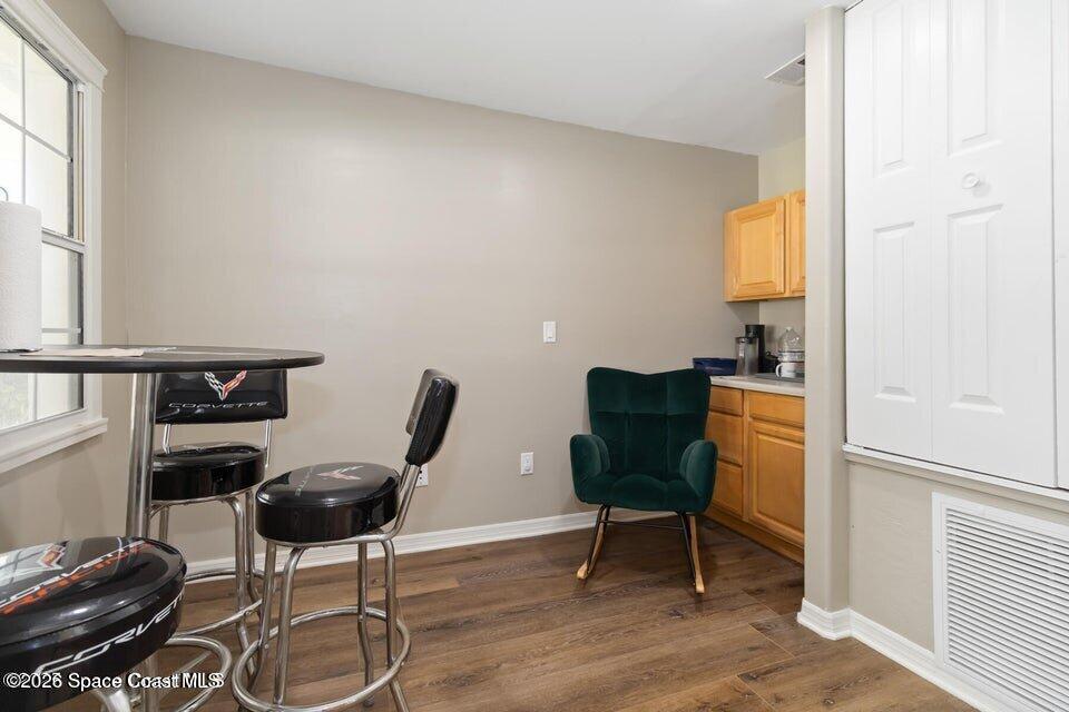 1280 Highway 1, Unit B Malabar, FL 32950 - Photo 20 of 26 a view of a workspace with furniture and a window