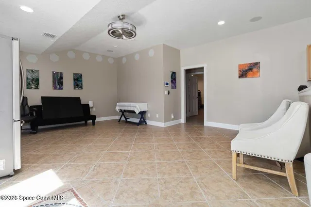 a view of work space with furniture and closet
