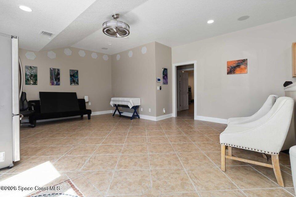 1280 Highway 1, Unit B Malabar, FL 32950 - Photo 6 of 26 a view of work space with furniture and closet