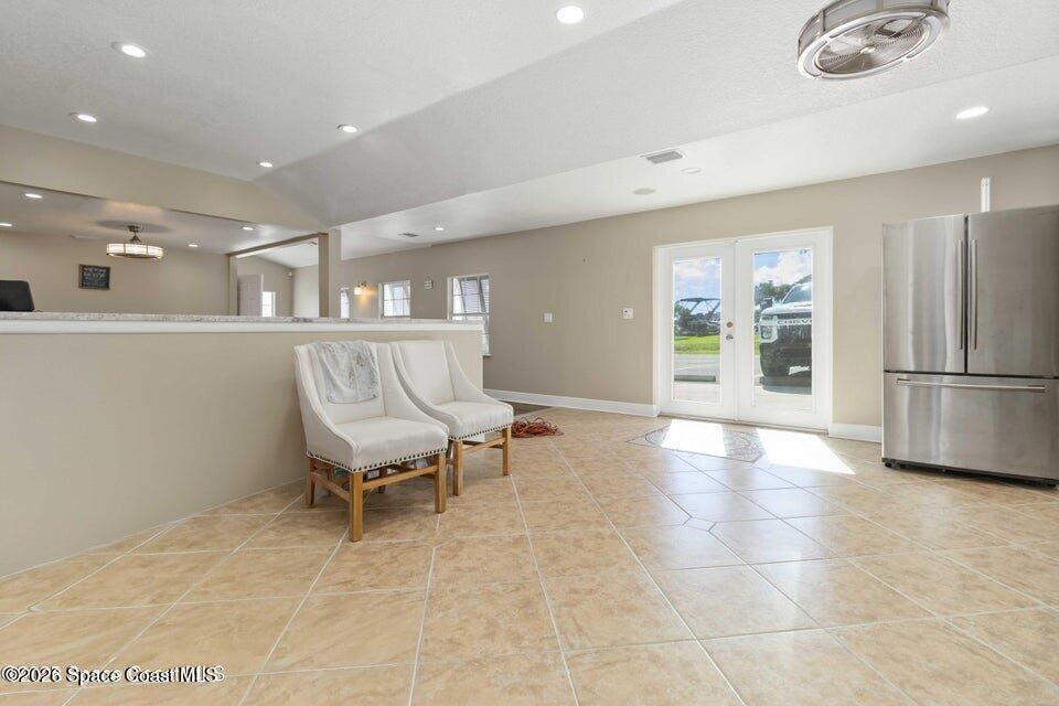 1280 Highway 1, Unit B Malabar, FL 32950 - Photo 7 of 26 a view of a kitchen with dining area and windows