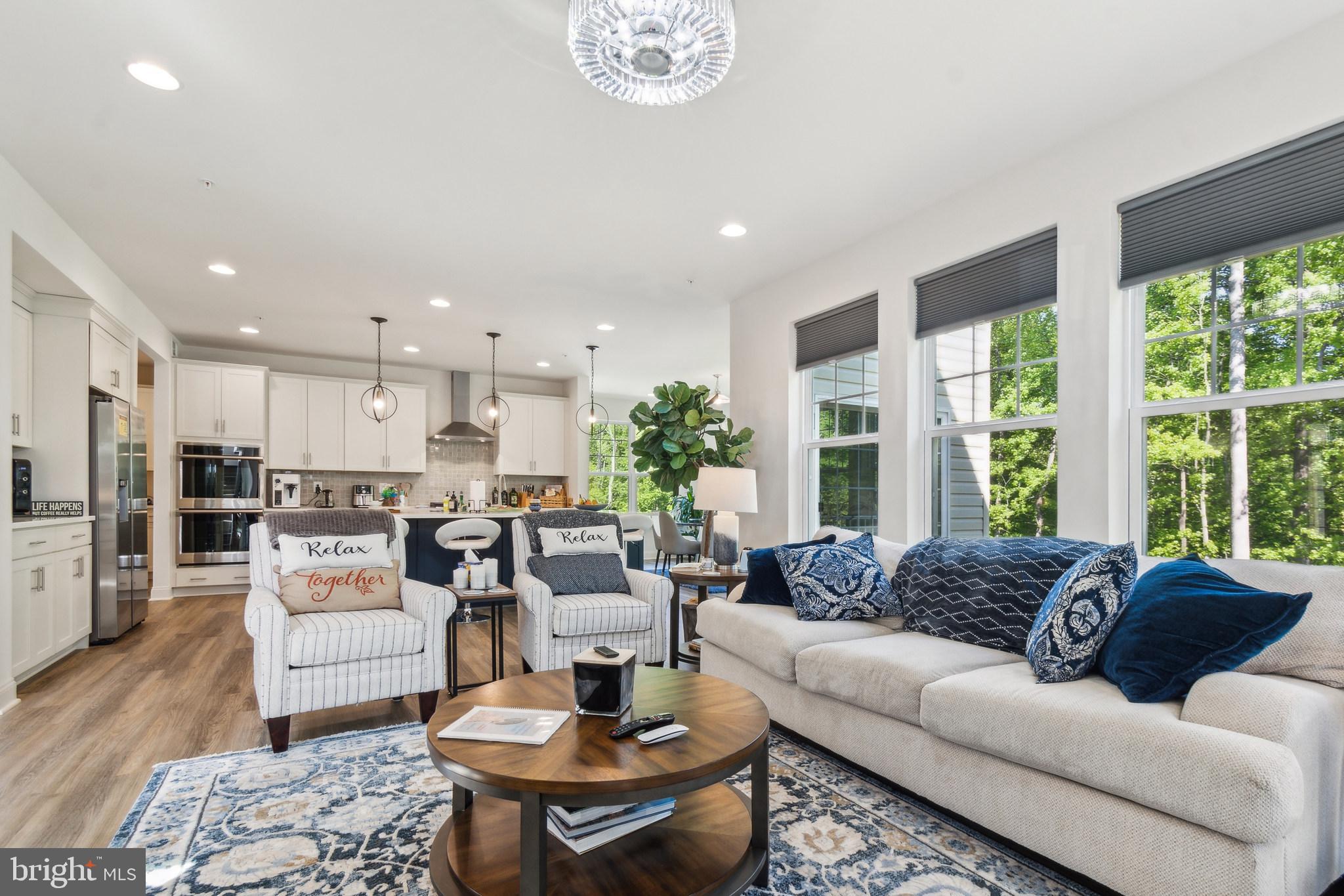 8604 Cedar Chase Drive Clinton, MD 20735 - Photo 11 of 68 a living room with furniture and a large window