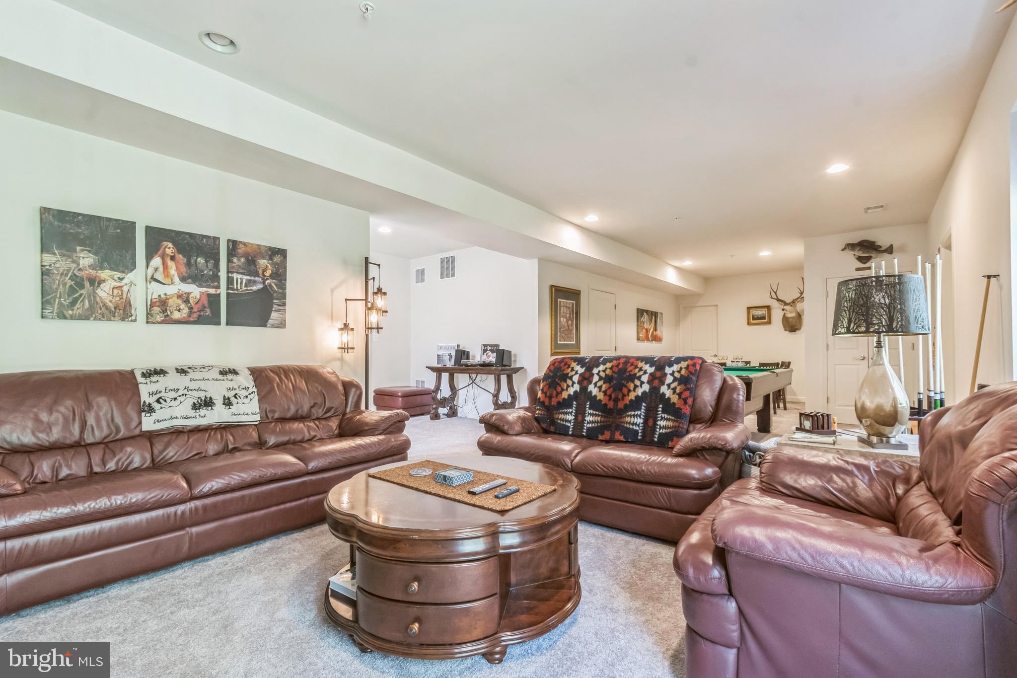8604 Cedar Chase Drive Clinton, MD 20735 - Photo 14 of 68 a living room with furniture and a large window