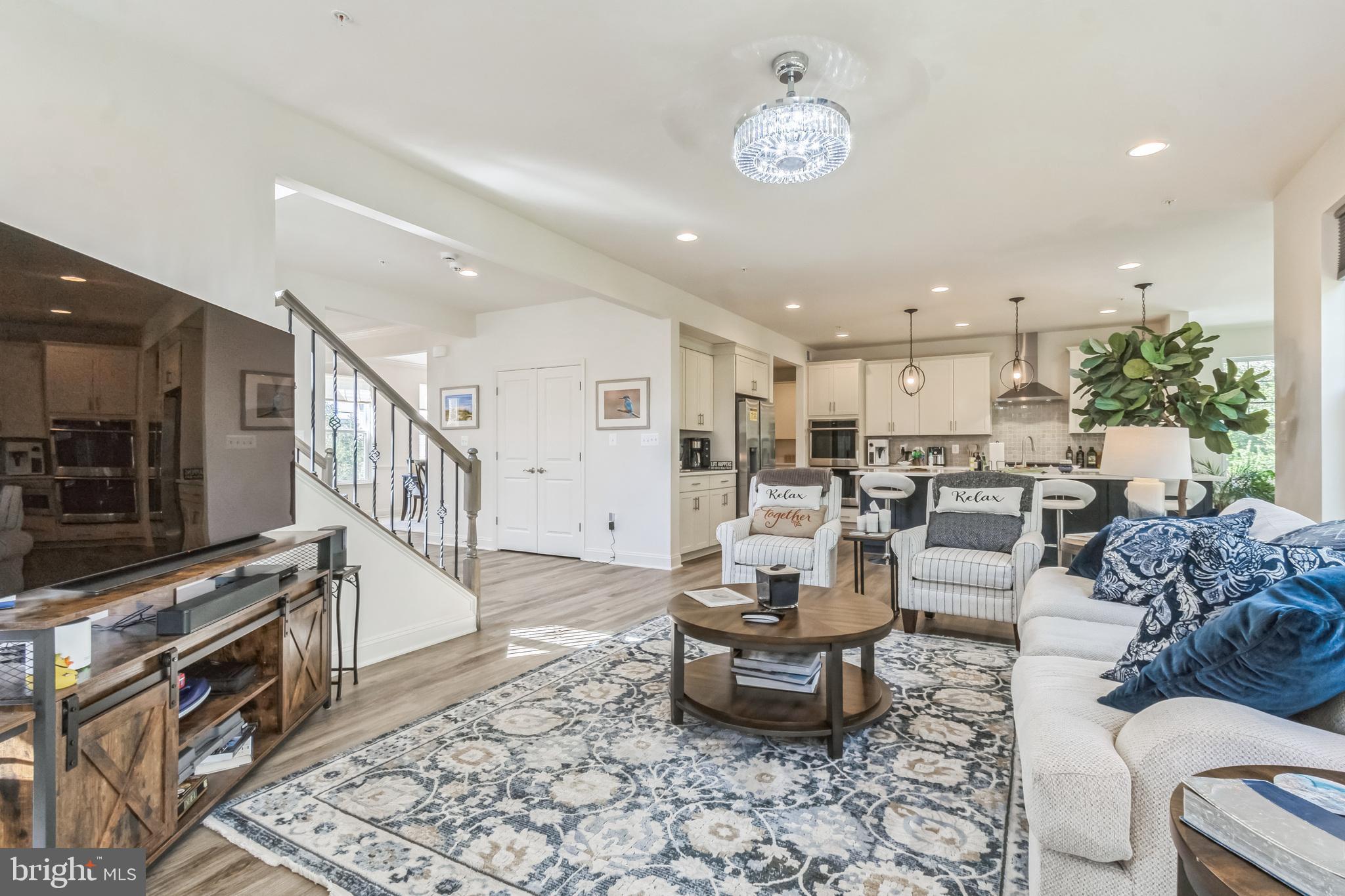 8604 Cedar Chase Drive Clinton, MD 20735 - Photo 18 of 68 a living room with furniture and a flat screen tv