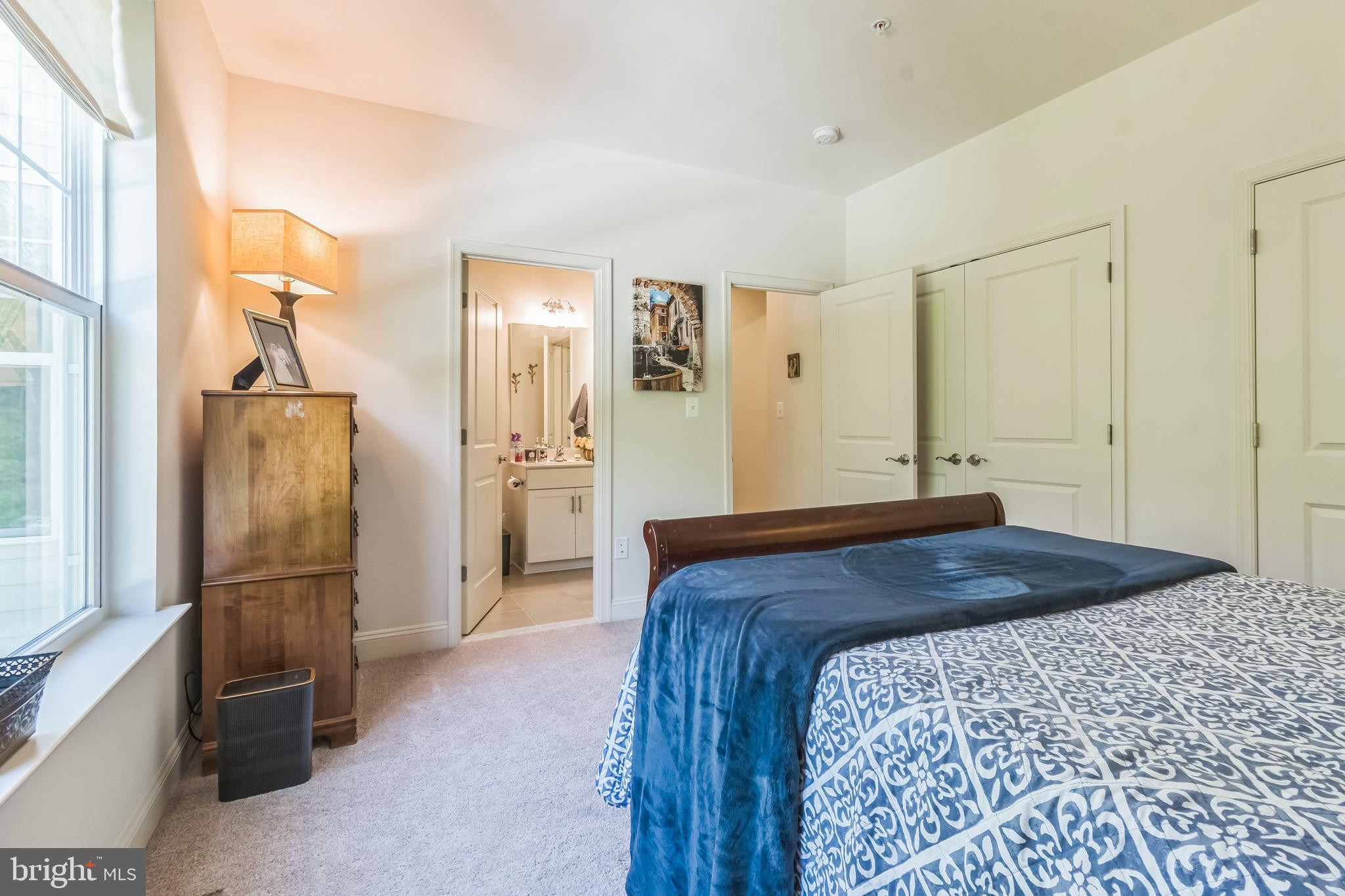 8604 Cedar Chase Drive Clinton, MD 20735 - Photo 24 of 68 a bedroom with a bed and a refrigerator