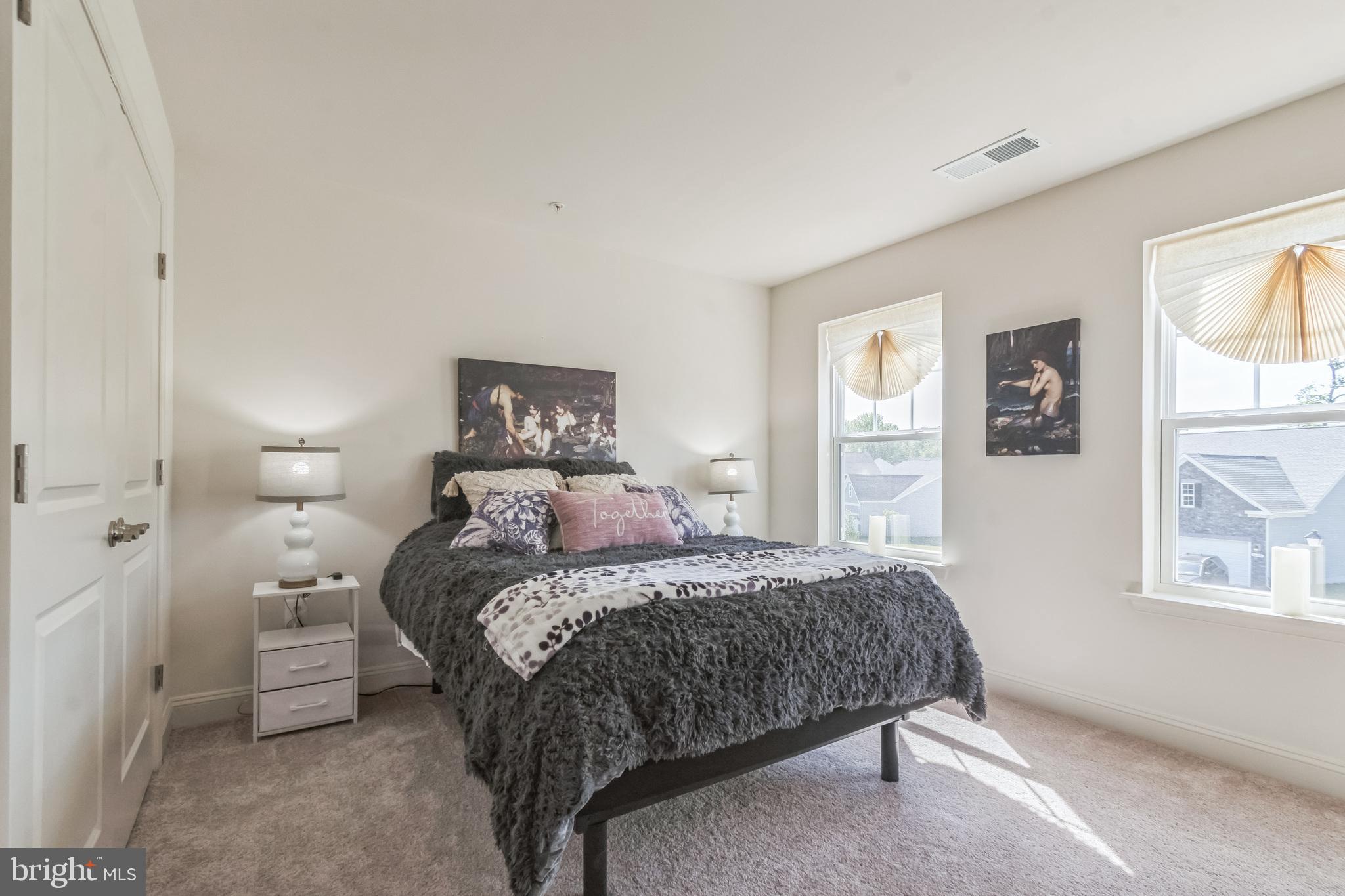 8604 Cedar Chase Drive Clinton, MD 20735 - Photo 25 of 68 a bedroom with a bed and a window
