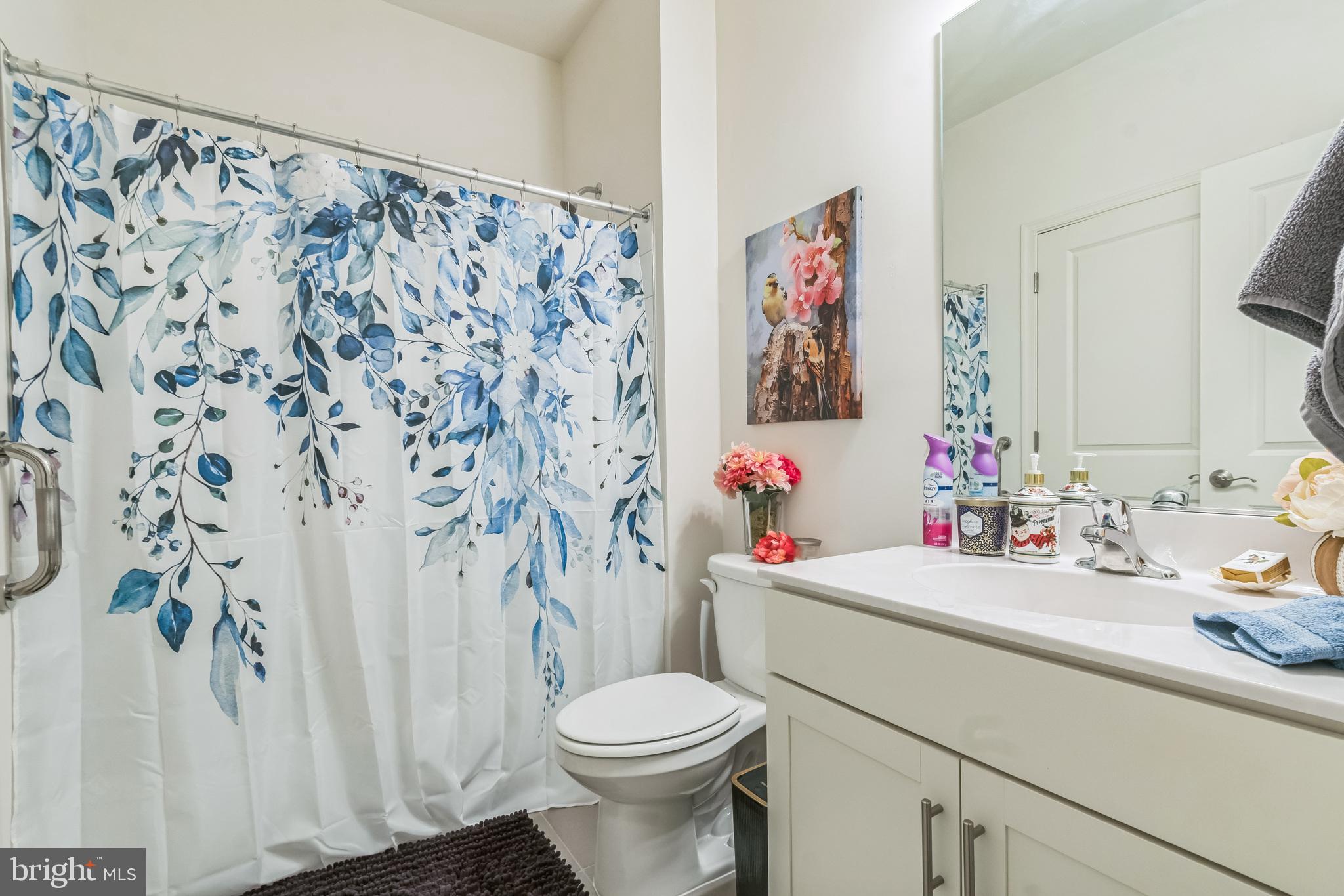 8604 Cedar Chase Drive Clinton, MD 20735 - Photo 32 of 68 a bathroom with a sink and a toilet
