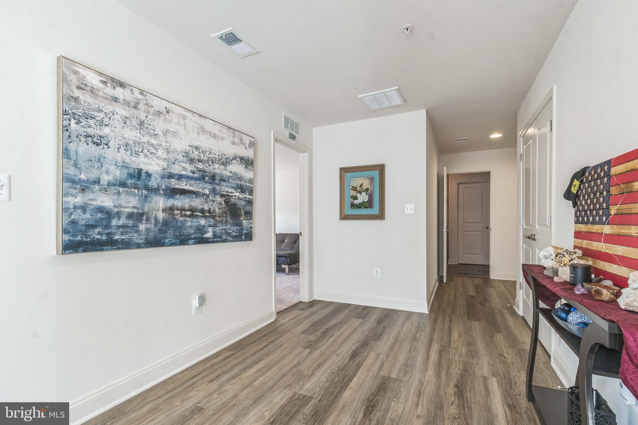 8604 Cedar Chase Drive Clinton, MD 20735 - Photo 39 of 68 a view of a bedroom with wooden floor and a window