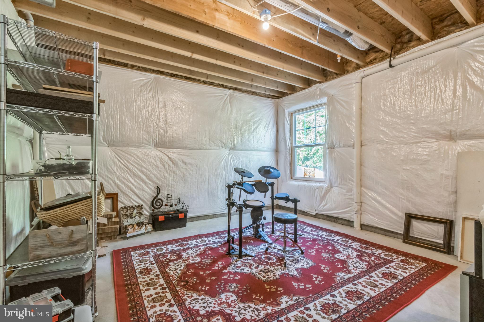 8604 Cedar Chase Drive Clinton, MD 20735 - Photo 44 of 68 a living room with a rug