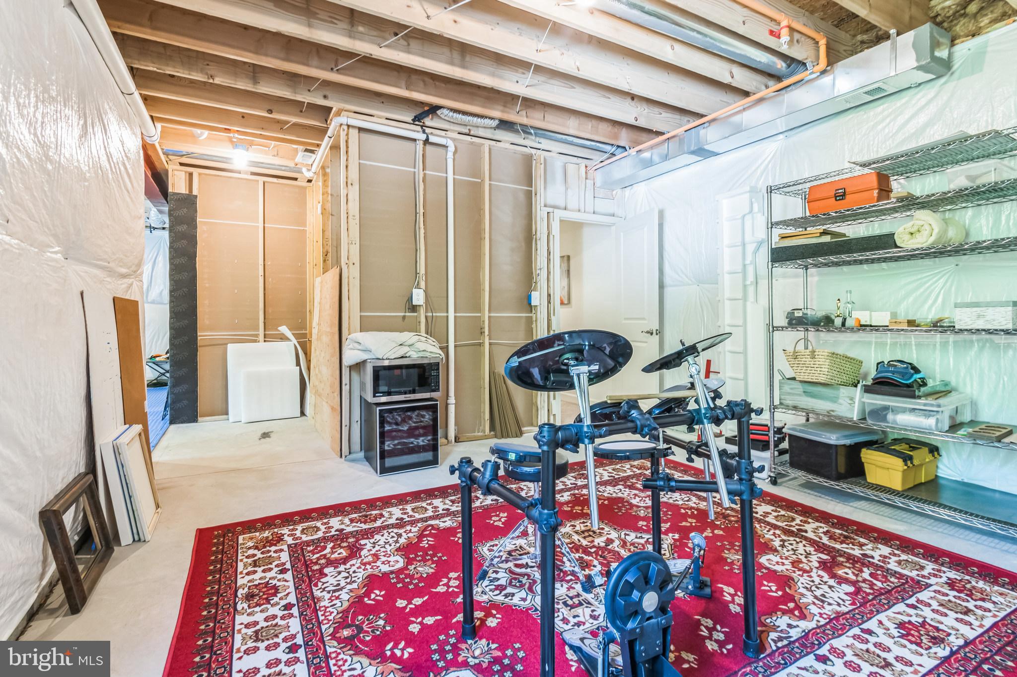 8604 Cedar Chase Drive Clinton, MD 20735 - Photo 45 of 68 a living room with furniture and a floor to ceiling window