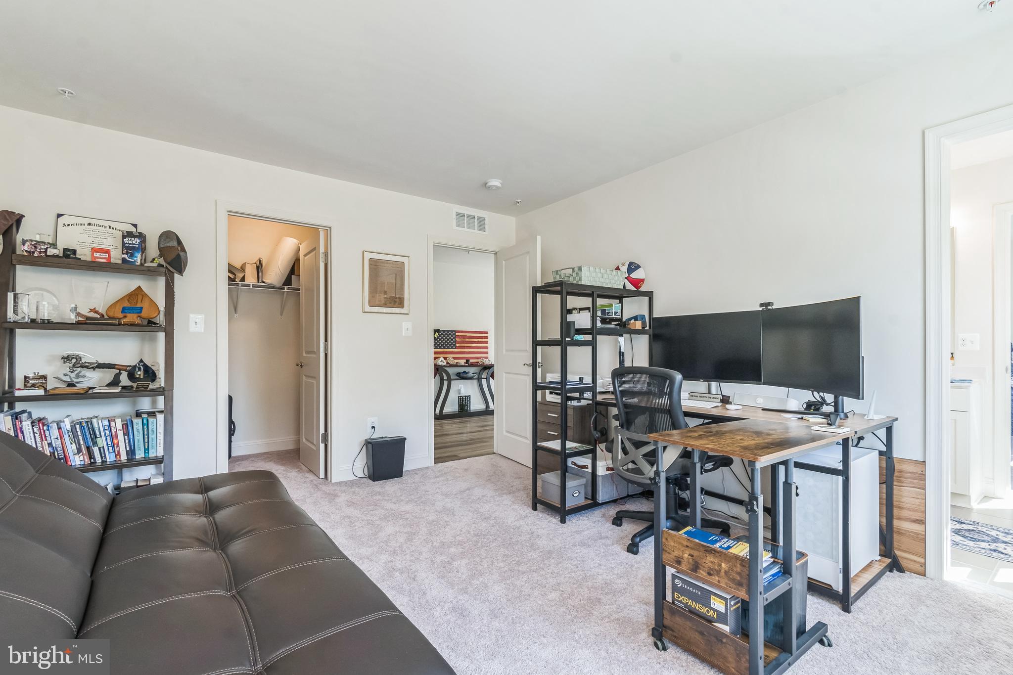 8604 Cedar Chase Drive Clinton, MD 20735 - Photo 47 of 68 a workspace with furniture and a flat screen tv