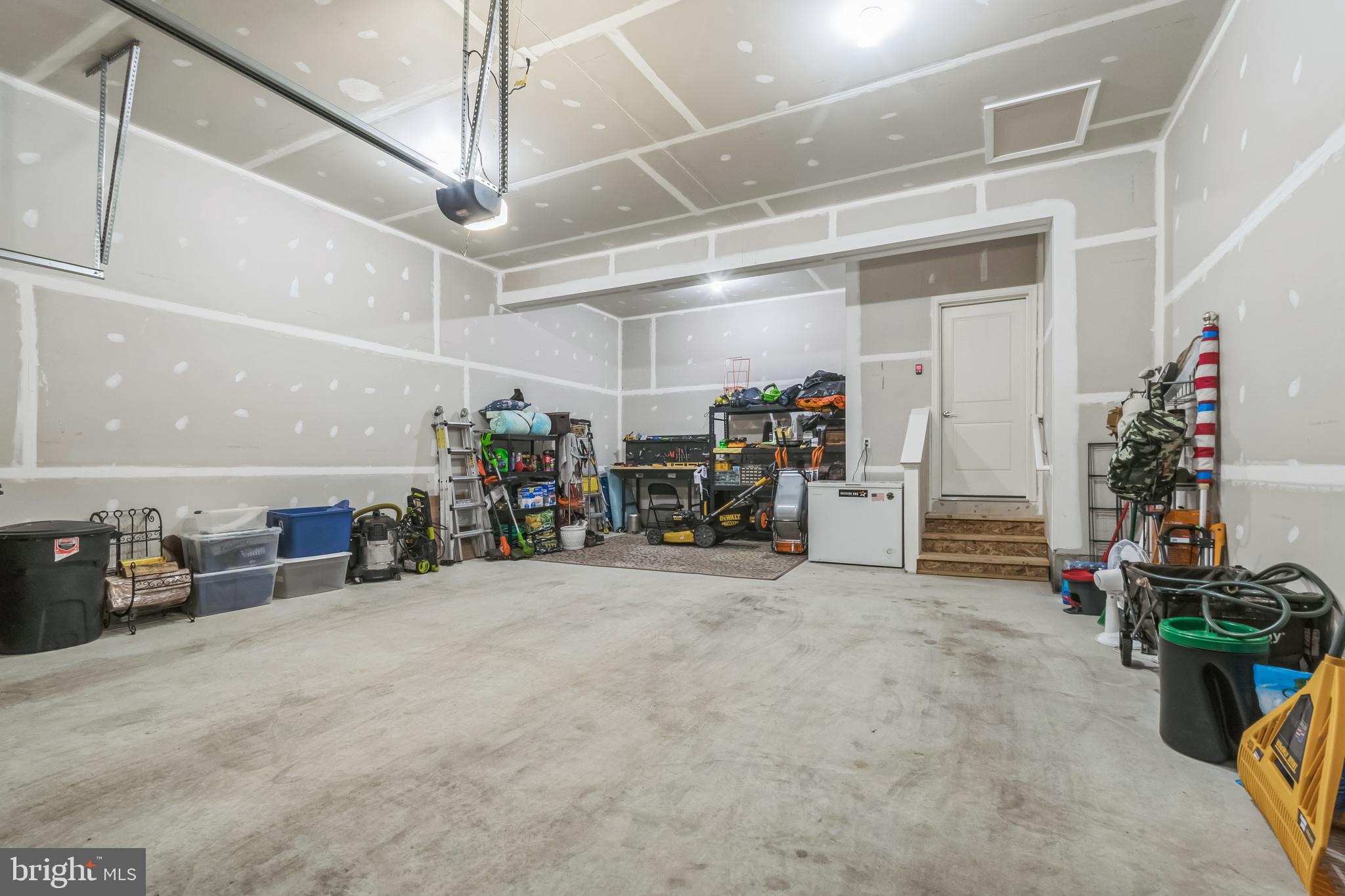 8604 Cedar Chase Drive Clinton, MD 20735 - Photo 50 of 68 a view of a garage with rack and bicycle