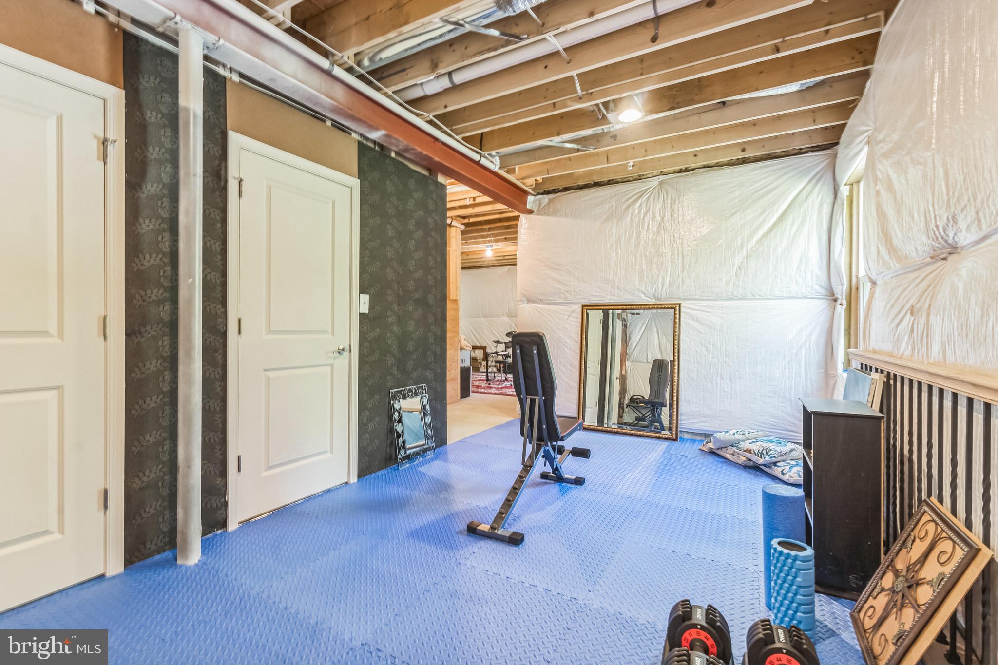 8604 Cedar Chase Drive Clinton, MD 20735 - Photo 52 of 68 a view of a room with gym equipment