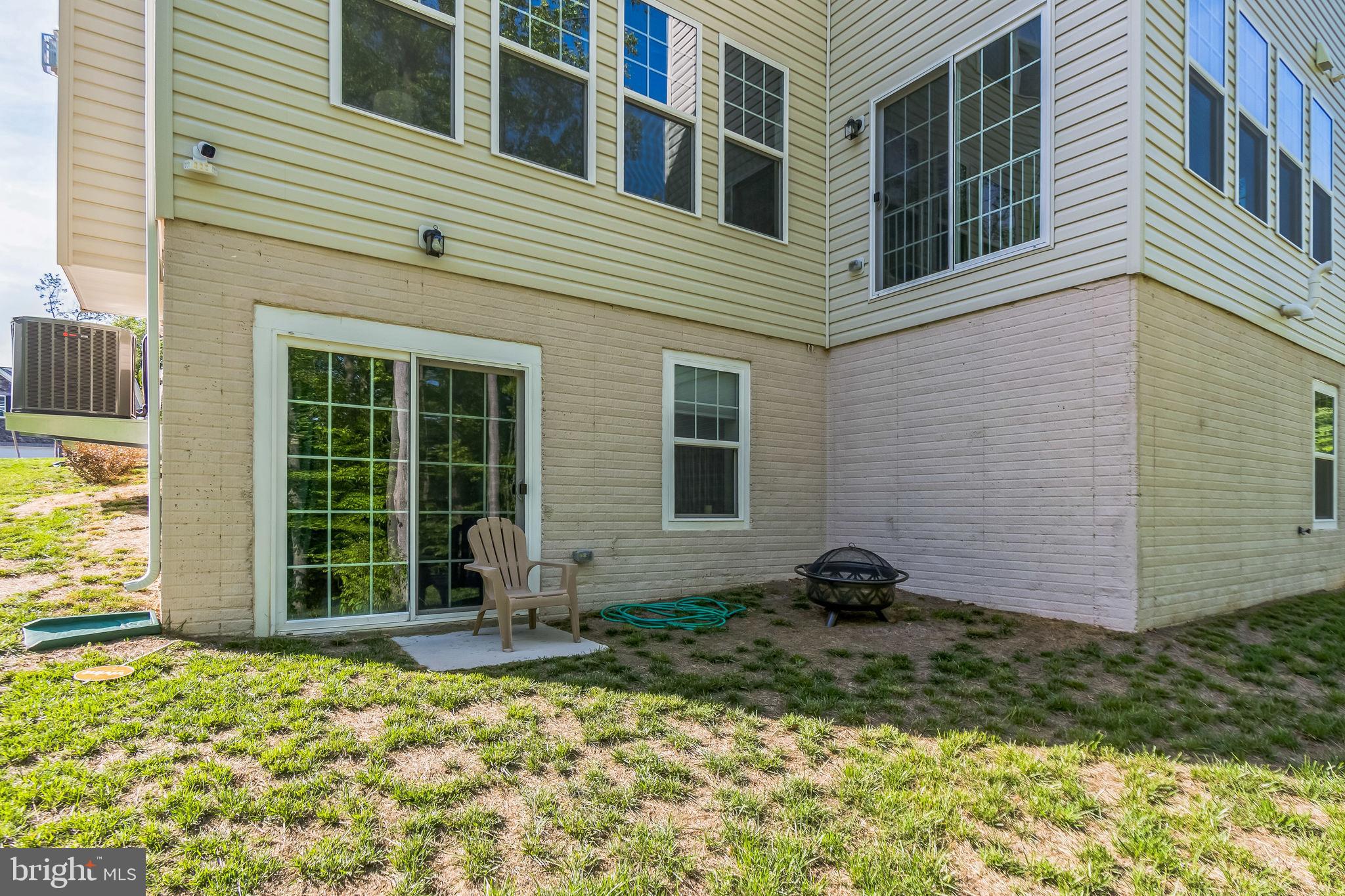 8604 Cedar Chase Drive Clinton, MD 20735 - Photo 54 of 68 a backyard of a house with seating space