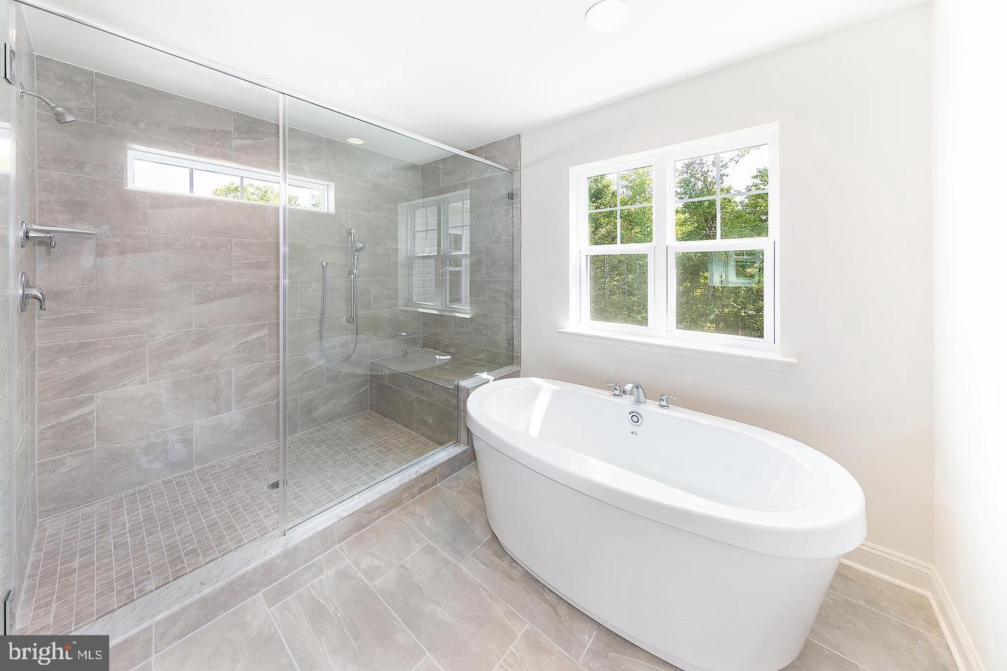 8604 Cedar Chase Drive Clinton, MD 20735 - Photo 66 of 68 a white bath tub sitting next to a window