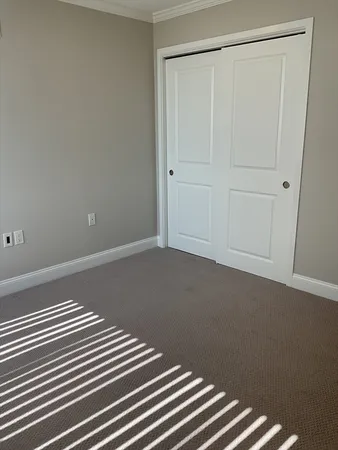 a view of a room with an empty space