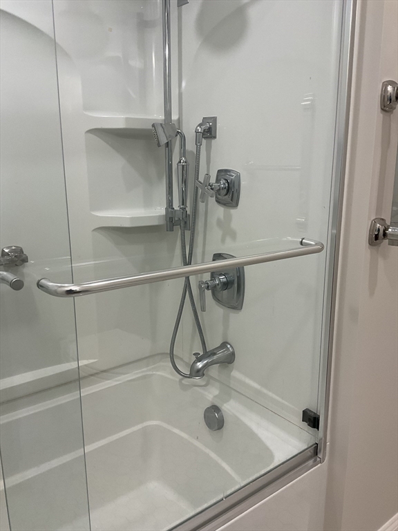 1006 Paradise Road, Unit PH Q Swampscott, MA 01907 - Photo 10 of 16 a bathroom with a shower