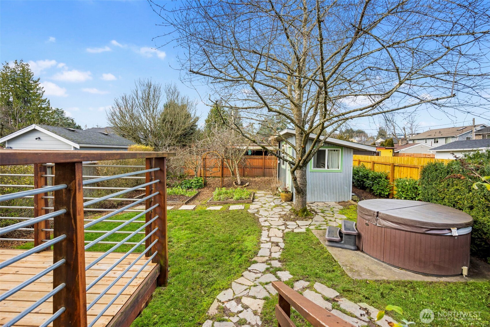 7813 46th Avenue South Seattle, WA 98118 - Photo 14 of 18 a front view of a house with garden