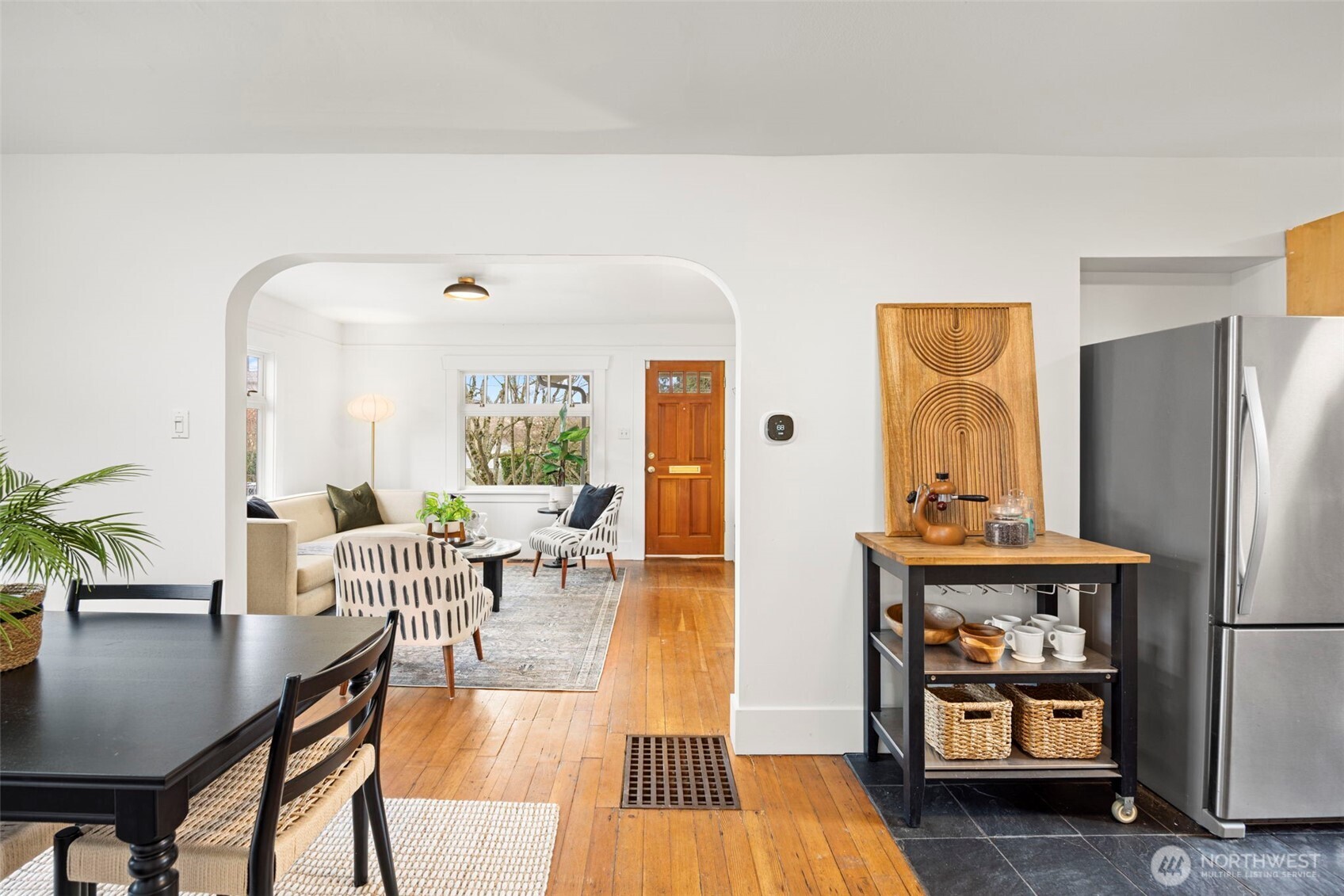 7813 46th Avenue South Seattle, WA 98118 - Photo 7 of 18 a living room with furniture and wooden floor