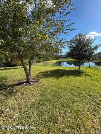 a front view of a house with parking area
