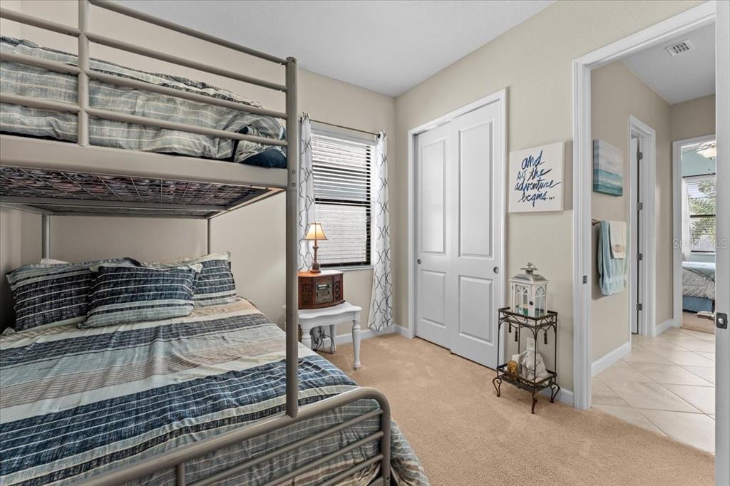 13443 White Sapphire Road Riverview, FL 33579 - Photo 26 of 47 a view of a livingroom with gym equipment