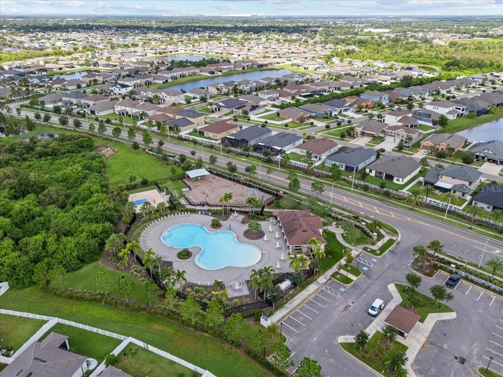 13443 White Sapphire Road Riverview, FL 33579 - Photo 35 of 47 an aerial view of a house with a swimming pool