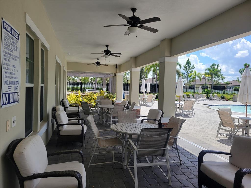 13443 White Sapphire Road Riverview, FL 33579 - Photo 38 of 47 a view of a dining room with furniture window and outside view