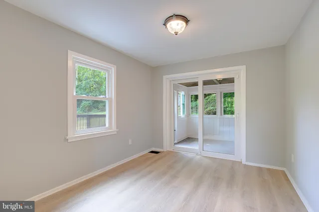 a view of kitchen with furniture and window