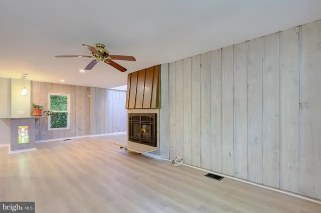 a view of balcony with a ceiling fan
