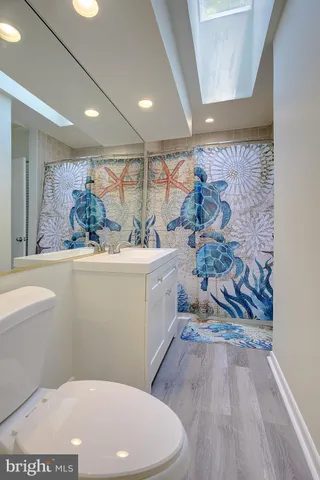 a view of a wooden balcony with wooden floor and fence