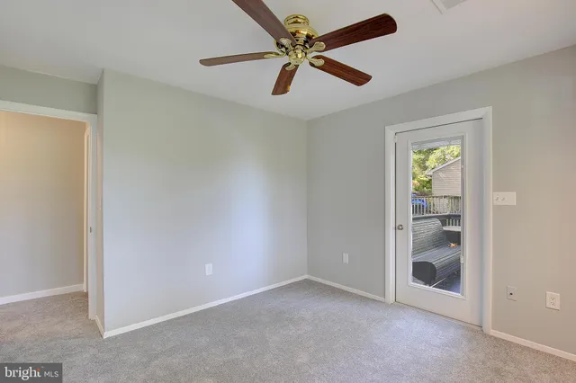 a view of deck with wooden floor and fence