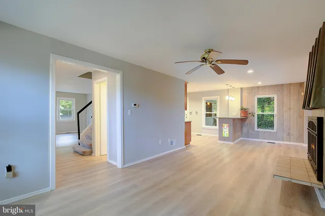 wooden floor in an empty room and a window