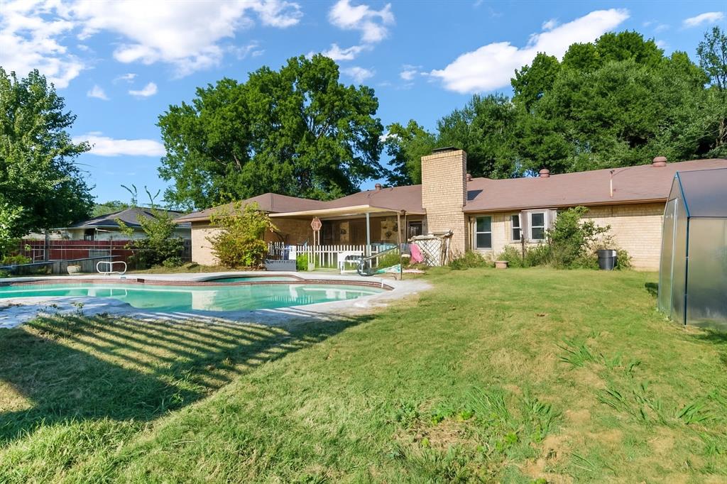 Welcome to this charming home with a spacious backyard featuring an in-ground pool and covered patio area. Perfect for relaxing or entertaining by the water.