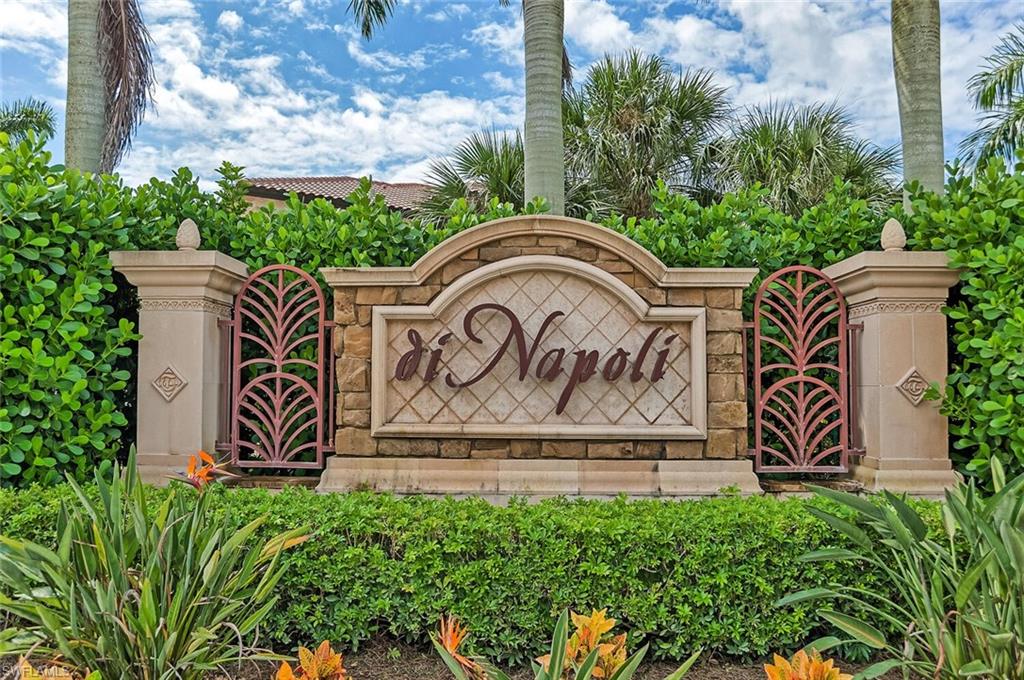 9107 Napoli Court, Unit 201 Naples, FL 34113 - Photo 2 of 35 a view of street sign under a tree