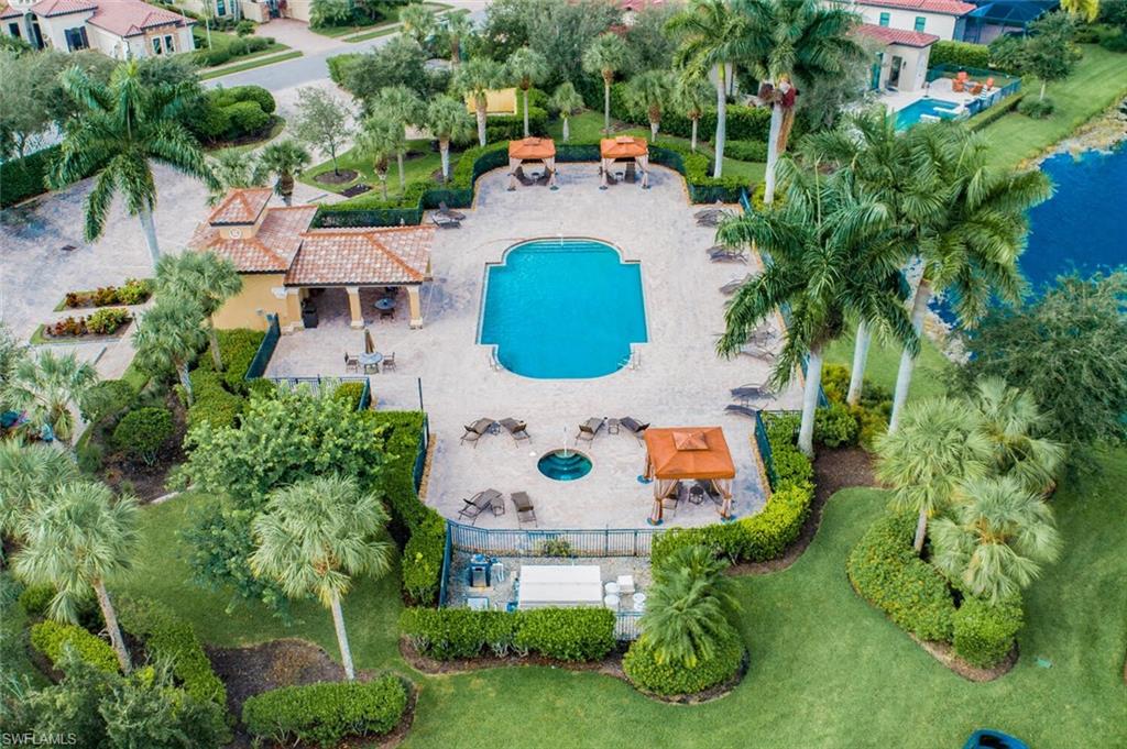 9107 Napoli Court, Unit 201 Naples, FL 34113 - Photo 3 of 35 an aerial view of a house with a yard and garden