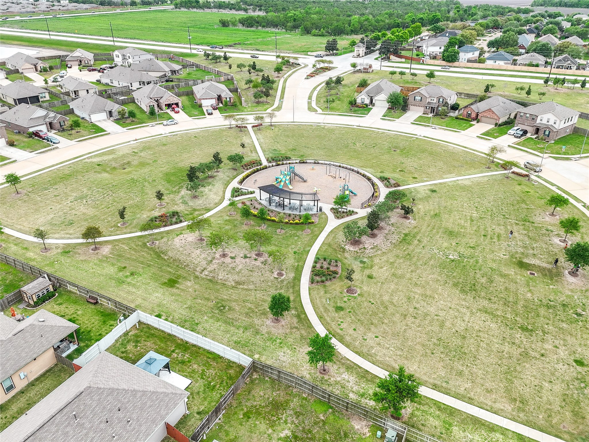 5912 Whitewing Road Rosenberg, TX 77469 - Photo 5 of 25 an aerial view of a swimming pool with a yard