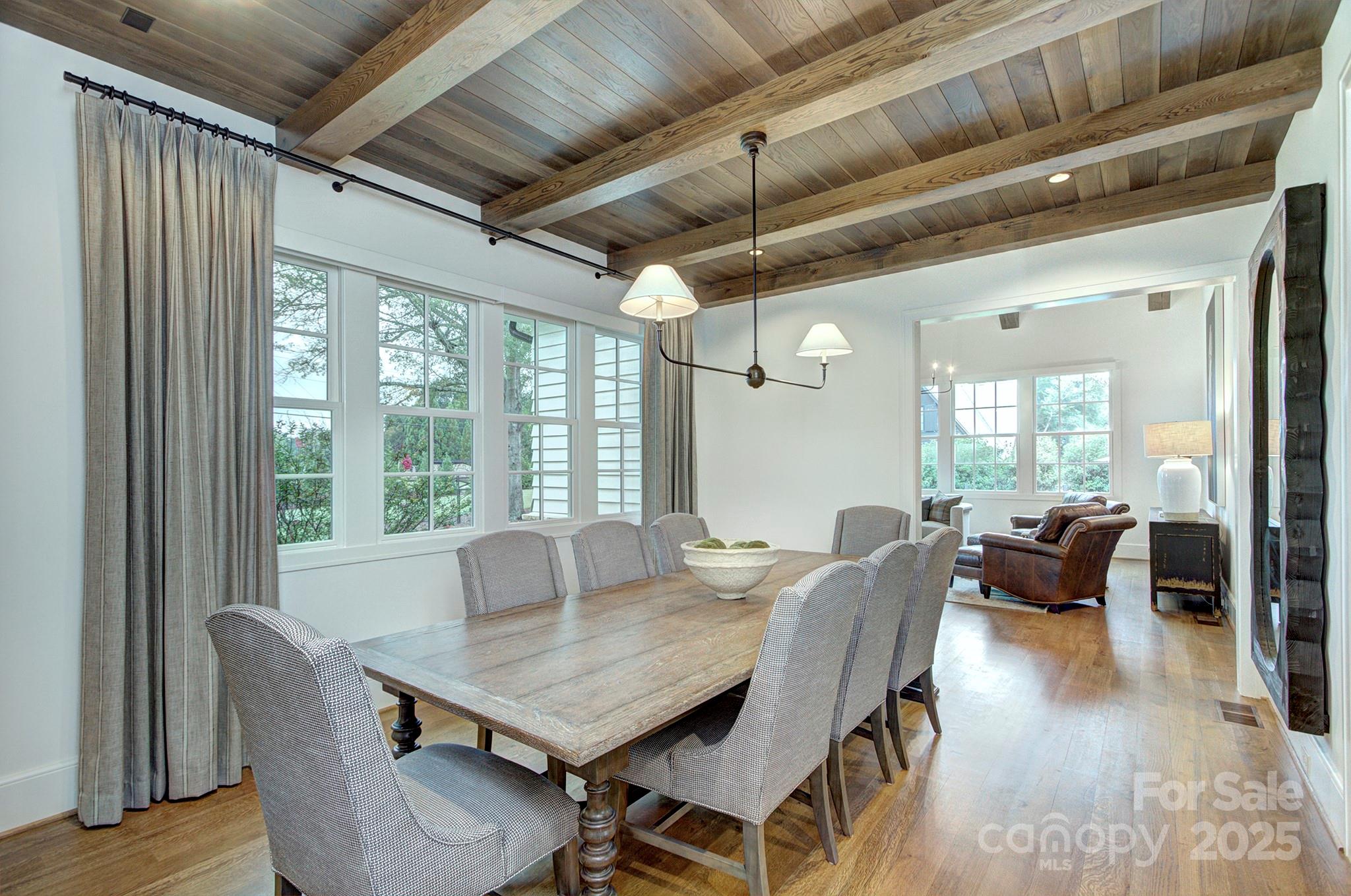 2270 New Gray Rock Road Fort Mill, SC 29708 - Photo 12 of 39 a view of a dining room with furniture window and wooden floor