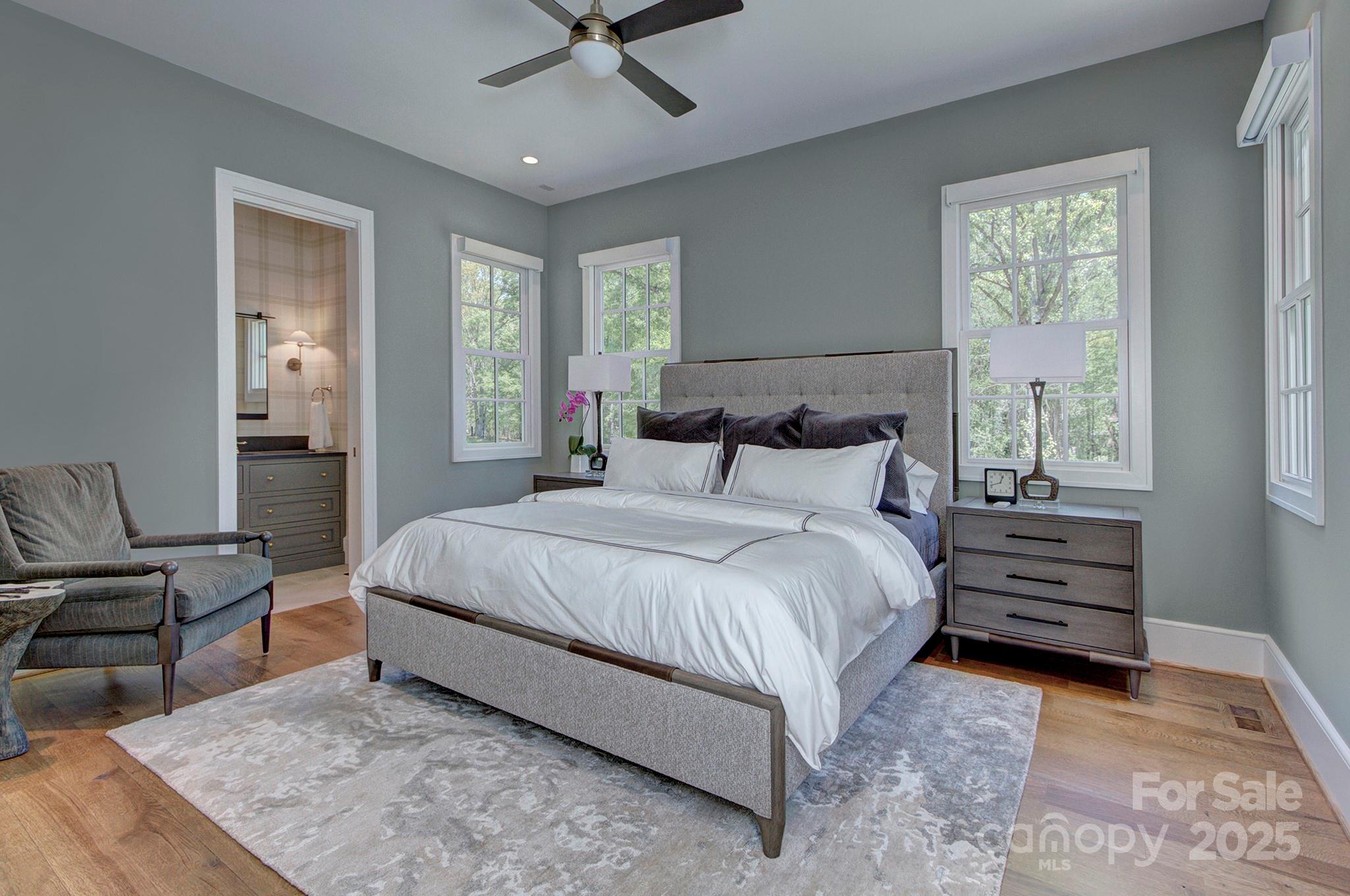 2270 New Gray Rock Road Fort Mill, SC 29708 - Photo 18 of 39 a bedroom with a bed and large windows
