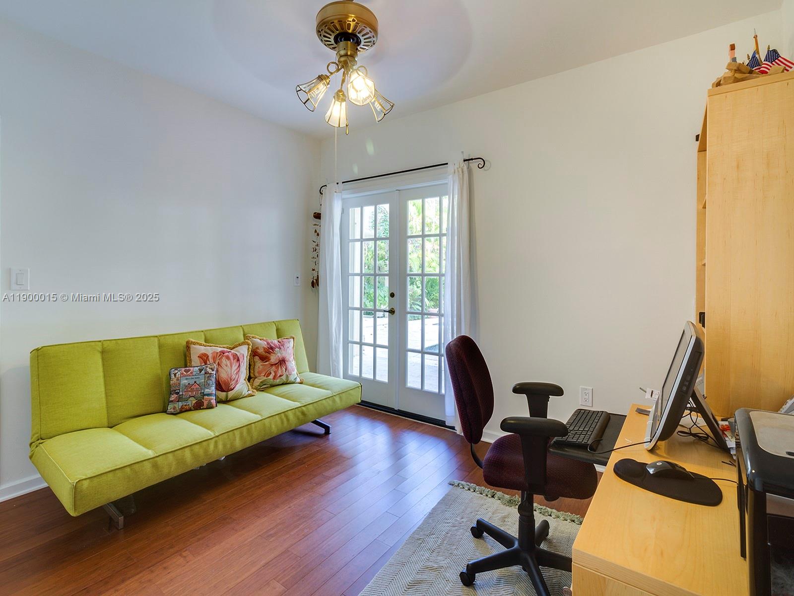 7950 Old Cutler Road Coral Gables, FL 33143 - Photo 15 of 30 a living room with furniture and a flat screen tv