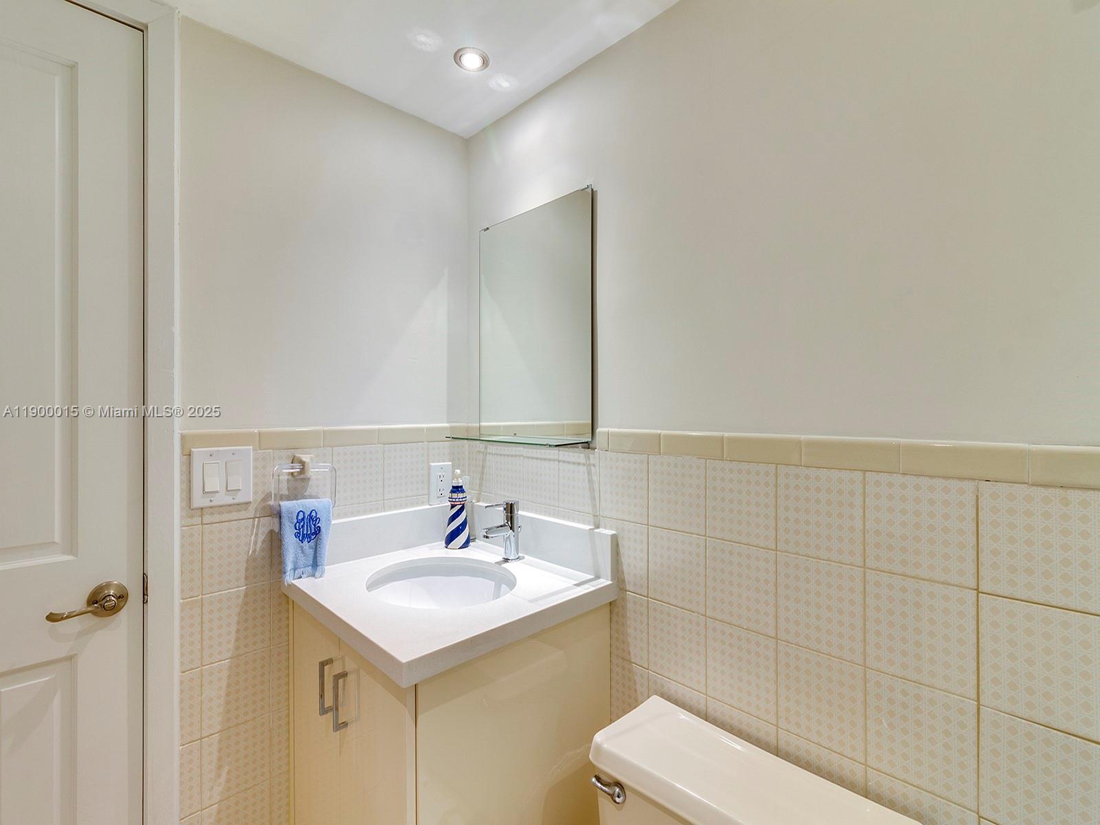 7950 Old Cutler Road Coral Gables, FL 33143 - Photo 28 of 30 a bathroom with a sink toilet and shower