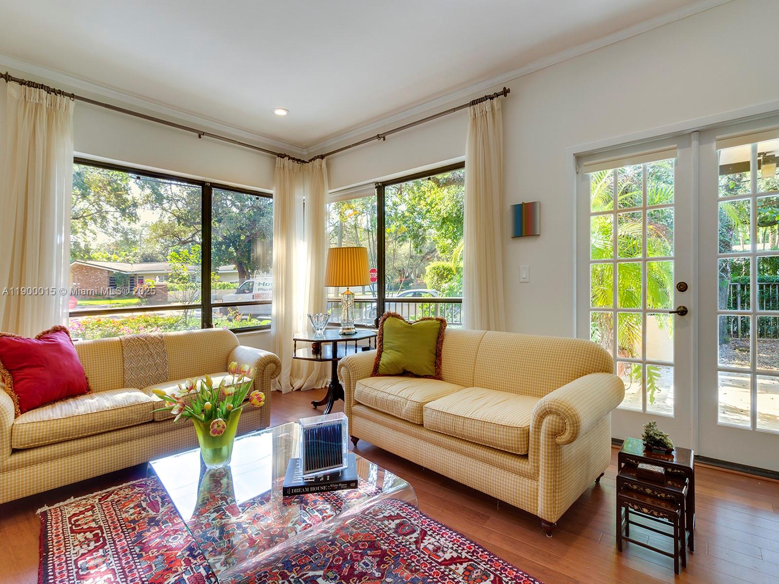 7950 Old Cutler Road Coral Gables, FL 33143 - Photo 5 of 30 a living room with furniture and a large window