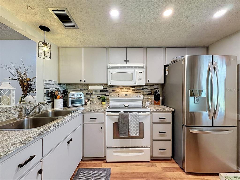 8220 7 Oaks Court, Unit 5 Port Richey, FL 34668 - Photo 4 of 22