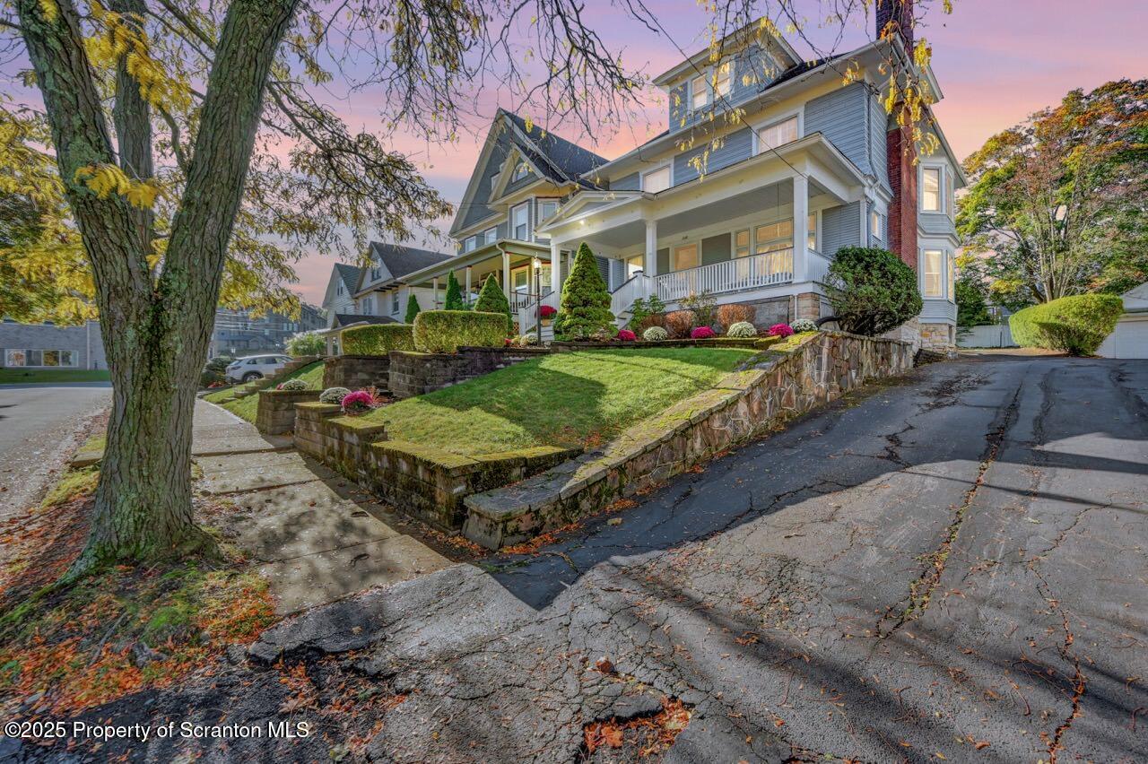1118 Columbia Street Scranton, PA 18509 - Photo 2 of 92 a view of a house with backyard and a tree