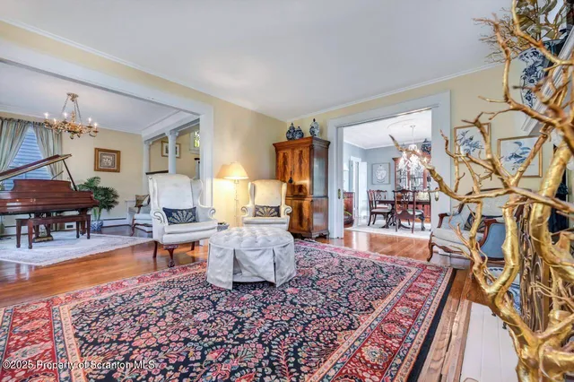 a kitchen with white cabinets and sink
