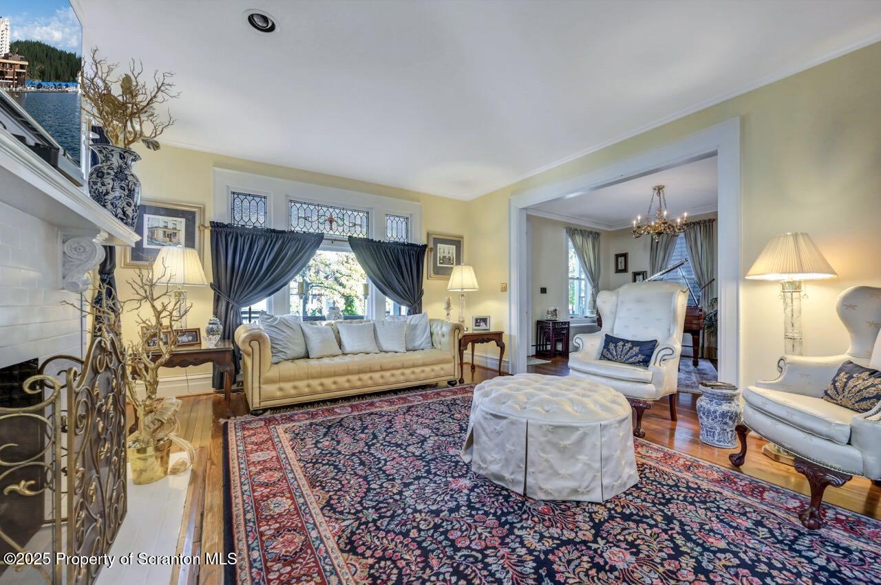 1118 Columbia Street Scranton, PA 18509 - Photo 22 of 92 a living room with furniture and a fireplace