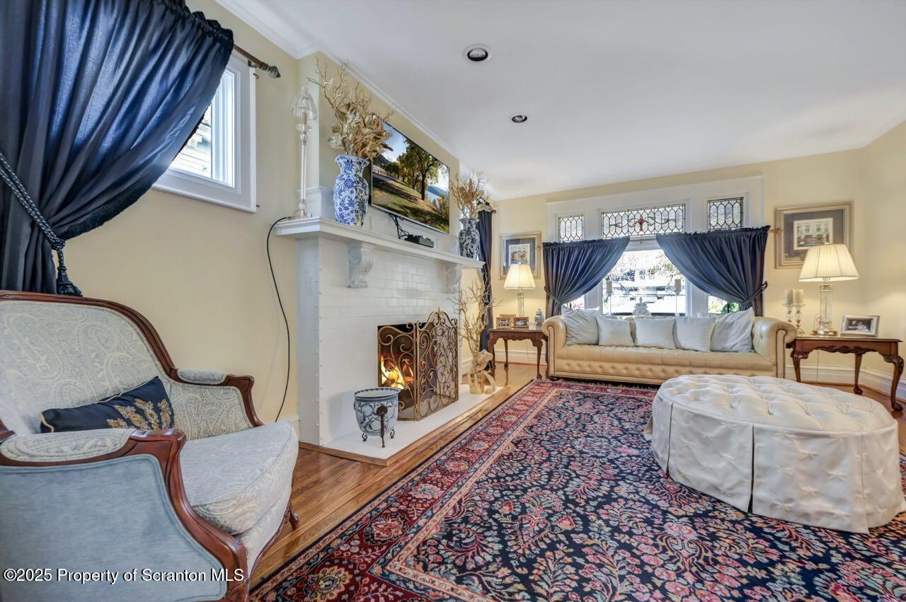 1118 Columbia Street Scranton, PA 18509 - Photo 23 of 92 a living room with furniture and a wooden floor