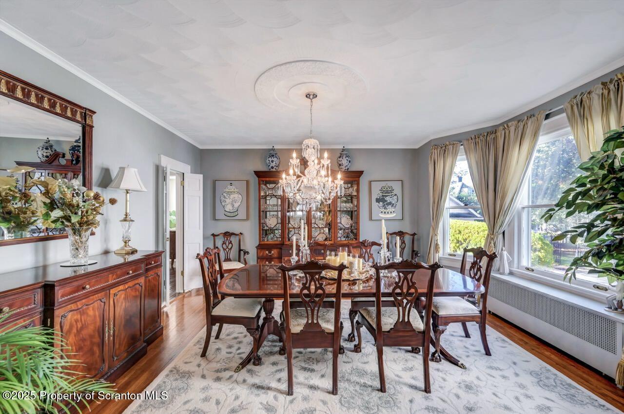 1118 Columbia Street Scranton, PA 18509 - Photo 24 of 92 a view of a dining room with furniture window and wooden floor