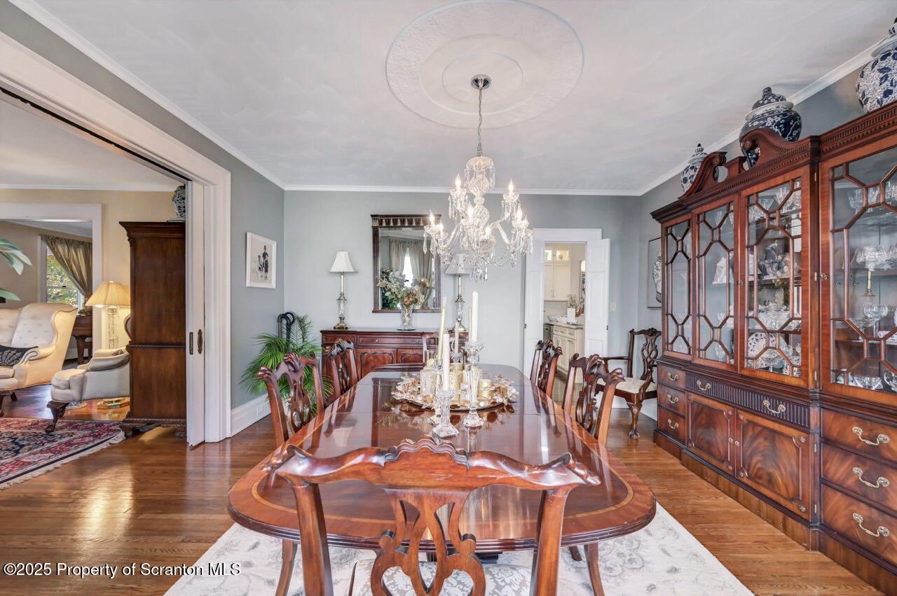 1118 Columbia Street Scranton, PA 18509 - Photo 26 of 92 a view of a dining room with furniture and wooden floor