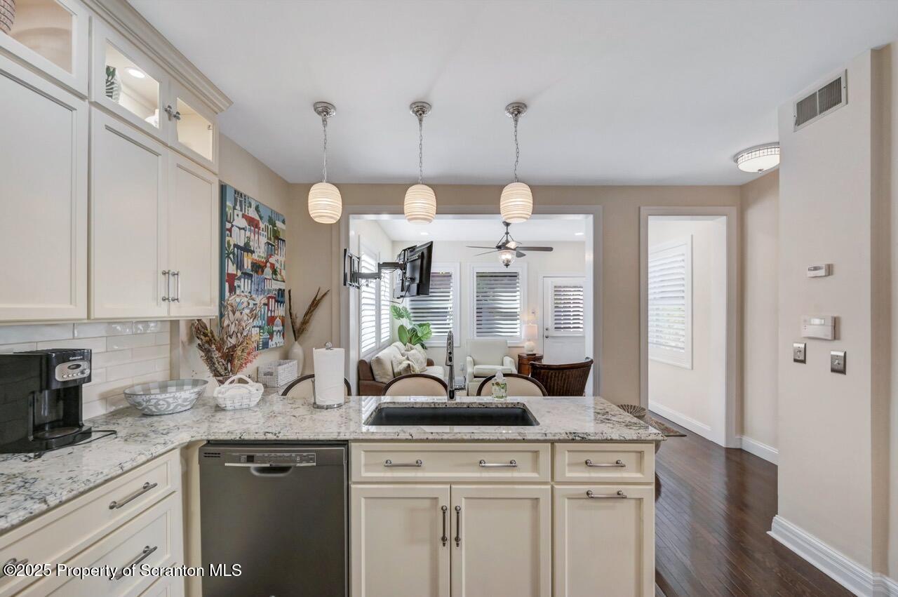 1118 Columbia Street Scranton, PA 18509 - Photo 35 of 92 a kitchen with white cabinets and sink