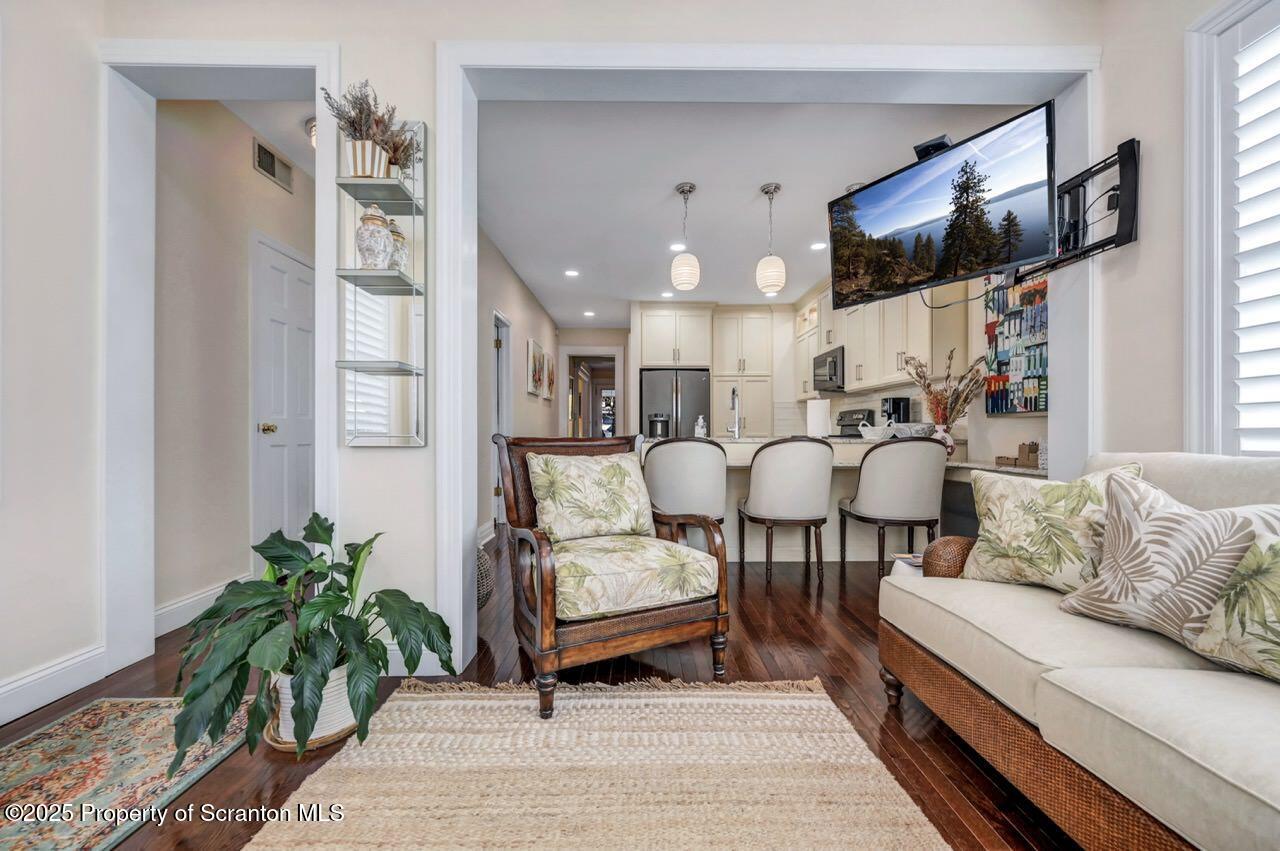 1118 Columbia Street Scranton, PA 18509 - Photo 41 of 92 a living room with furniture and a flat screen tv