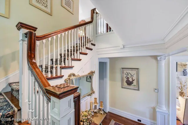 a view of a living room and hardwood floor